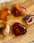 Sarah Belle carnelian heart palm stone for sacral chakra