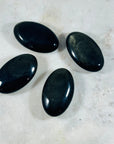 sarah belle gold sheen obsidian palm stone