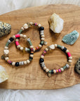 sarah belle live happy stacking bracelets pink