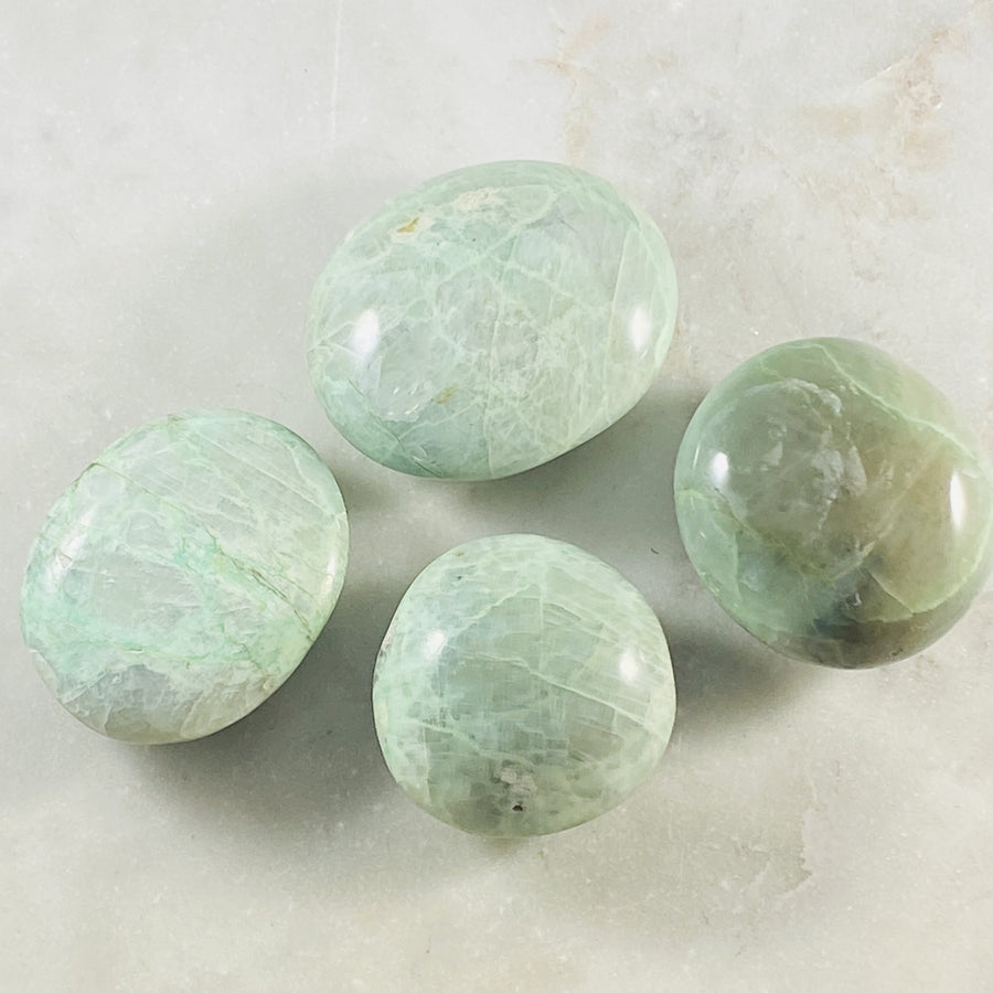 green moonstone palm stone medium for emotional balance