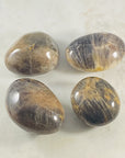 Black moonstone palm stone
