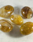Golden healer quartz palm stone sarah belle
