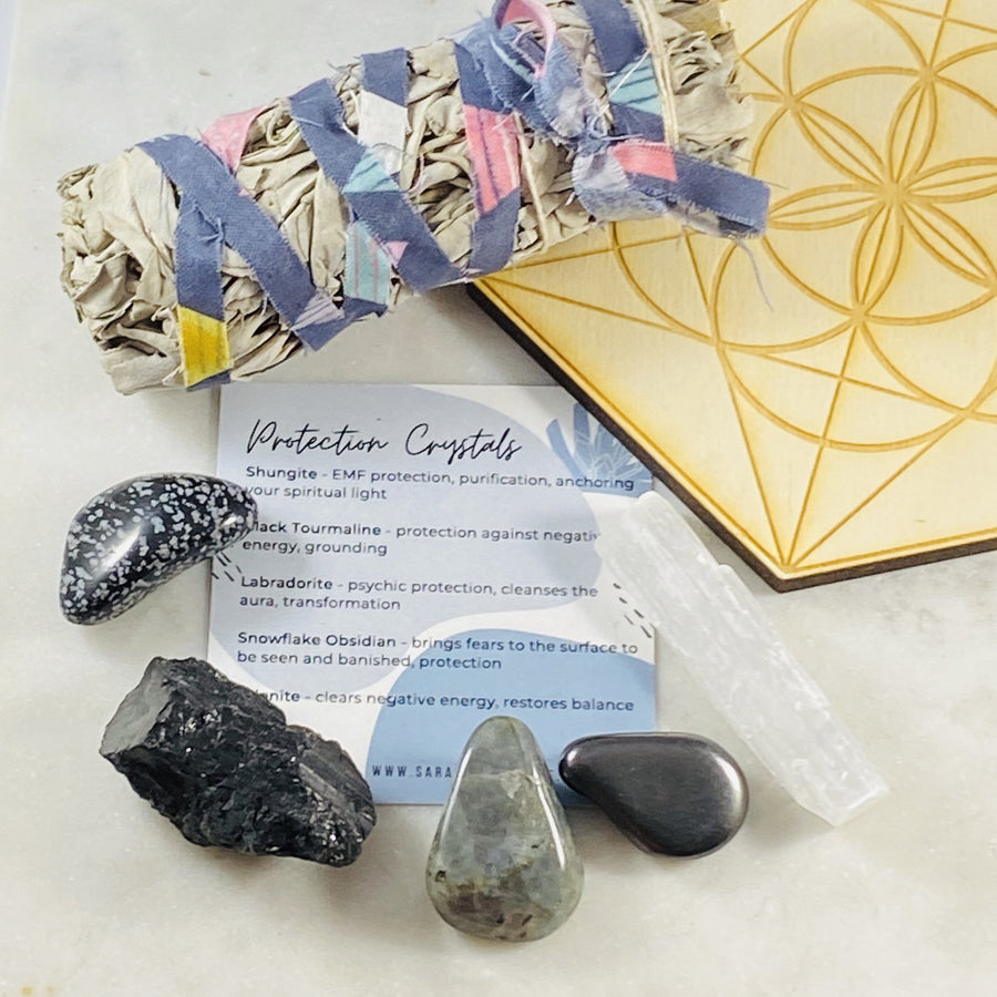 Protection crystals, sage and crystal grid by Sarah Belle