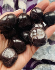 garnet tumbled stone for root chakra from sarah belle