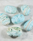 Sarah Belle blue aragonite palm stone for throat chakdra