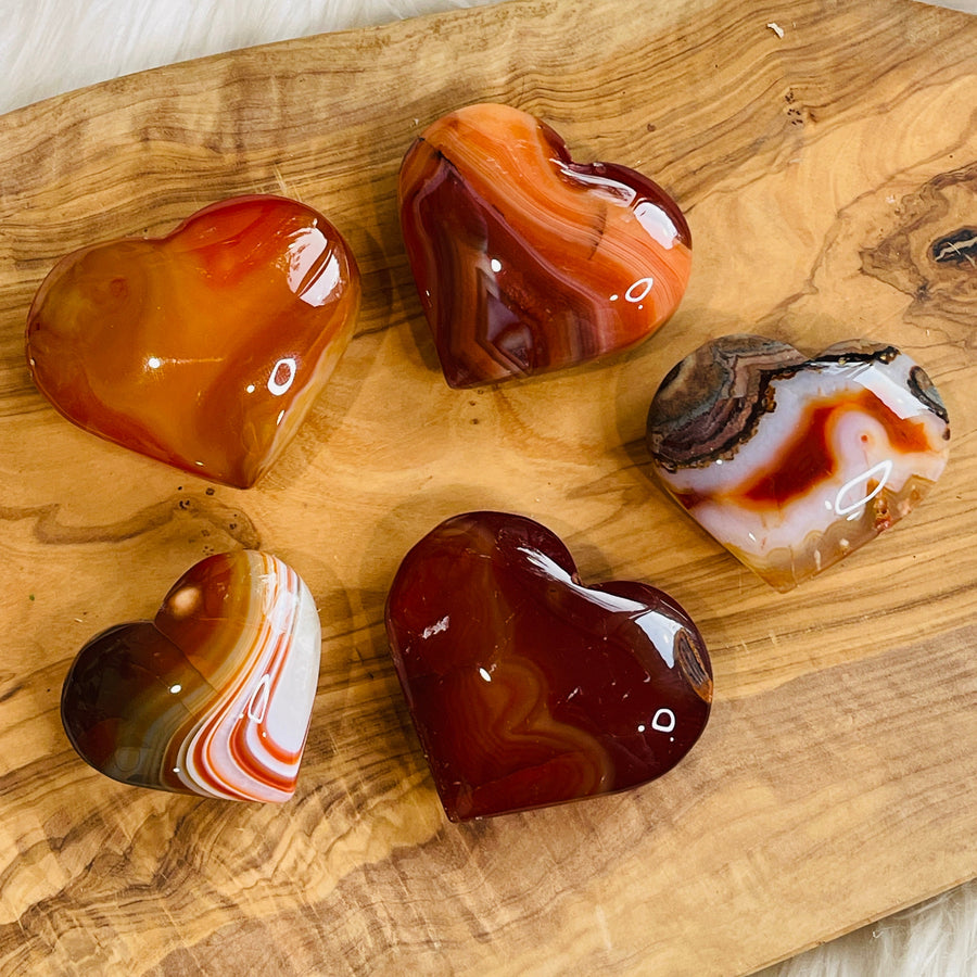 Sarah Belle carnelian heart palm stone for sacral chakra