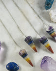 chakra crystal pendulums with silver chain from sarah belle