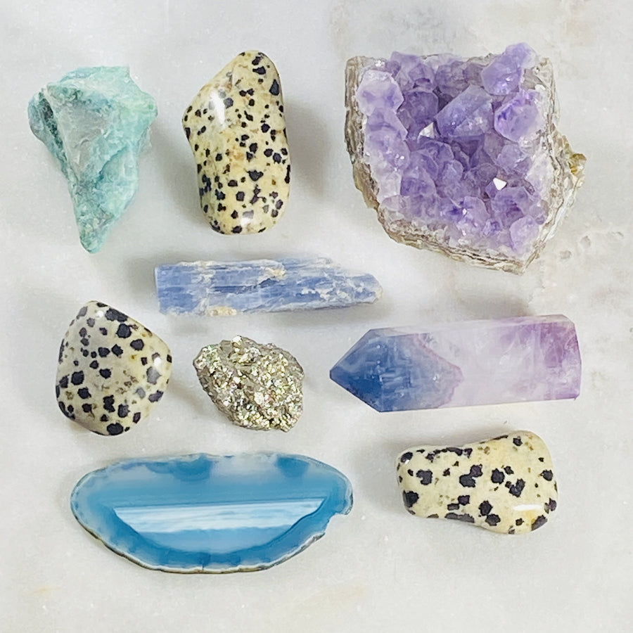 Tumbled dalmatian jasper and other crystals for raising your vibration