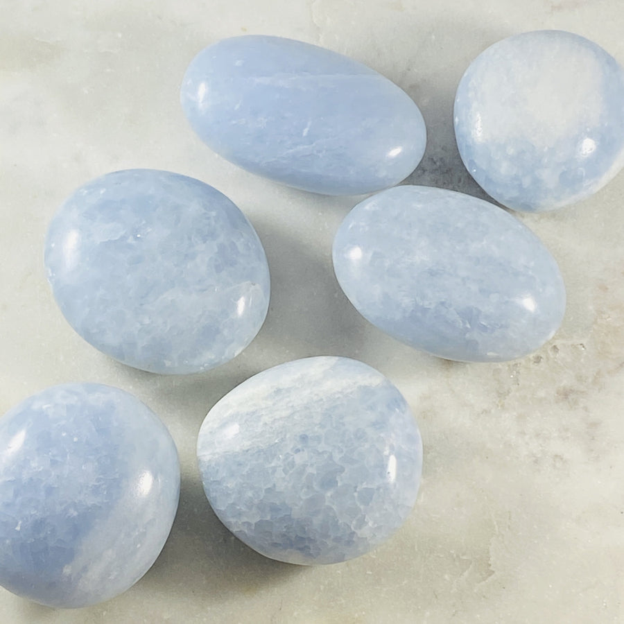 blue calcite palm stones from sarah belle