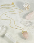 Handmade rose quartz necklace on gold plated chain and crystals by Sarah Belle