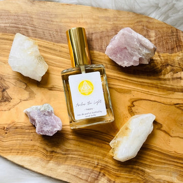 High frequency perfume bottled in the USA by Sarah Belle, the Happy crystal-infused eau de parfum features the frequencies of citrine, strawberry quartz, and kunzite, and has a bright and cherry energy that will uplift your spirits, energize your soul and align your heart with love, acceptance and joy. Perfect for crystal lovers and makes the perfect gift.