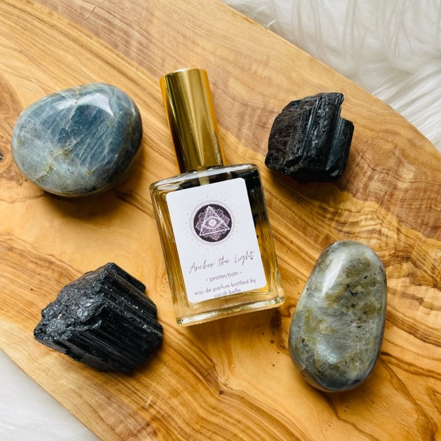 High frequency perfume bottled in the USA by Sarah Belle, the Protection crystal-infused eau de parfum features the frequencies of black tourmaline, obsidian, and labradorite, and carries the energies of protection, dissolving negative energy and cleansing your aura. Perfect for crystal lovers and makes the perfect gift.
