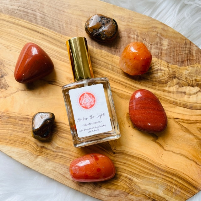 High frequency perfume bottled in the USA by Sarah Belle, the Transformation crystal-infused eau de parfum features the frequencies of red jasper, carnelian and tigers eye and carries the transformative energy of fire imparting a sense of empowerment, vitality and courage. Perfect for crystal lovers.
