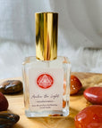 High frequency perfume bottled in the USA by Sarah Belle, the Transformation crystal-infused eau de parfum features the frequencies of red jasper, carnelian and tigers eye and carries the transformative energy of fire imparting a sense of empowerment, vitality and courage. Perfect for crystal lovers.