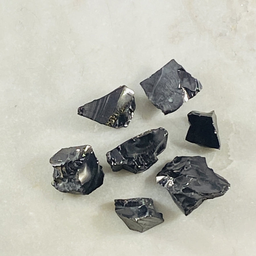 Noble Shungite by Sarah Belle, healing crystal energy to boost your aural health.