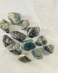 Ocean Jasper tumbled stone for grounding and healing crystal energy, useful for meditation.