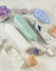 Rainbow moonstone points for crystal healing and resolving emotional wounds