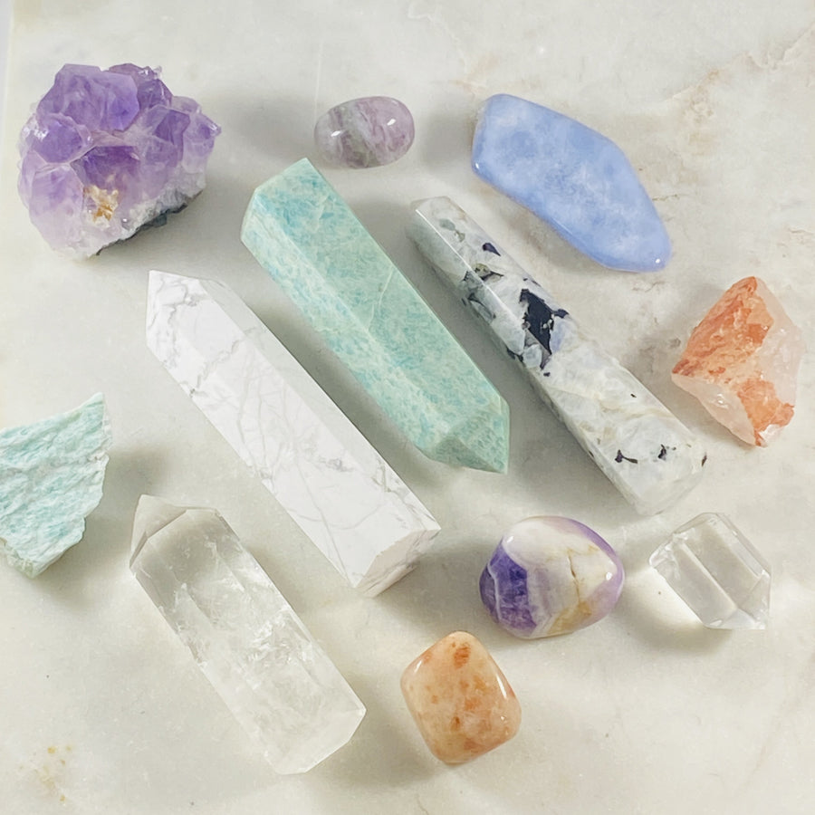Rainbow moonstone points for crystal healing and resolving emotional wounds