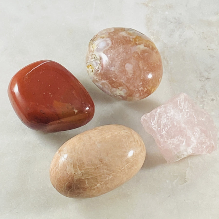 Red Jasper palm stone by Sarah Belle to block electromagnetic stress and radiation.